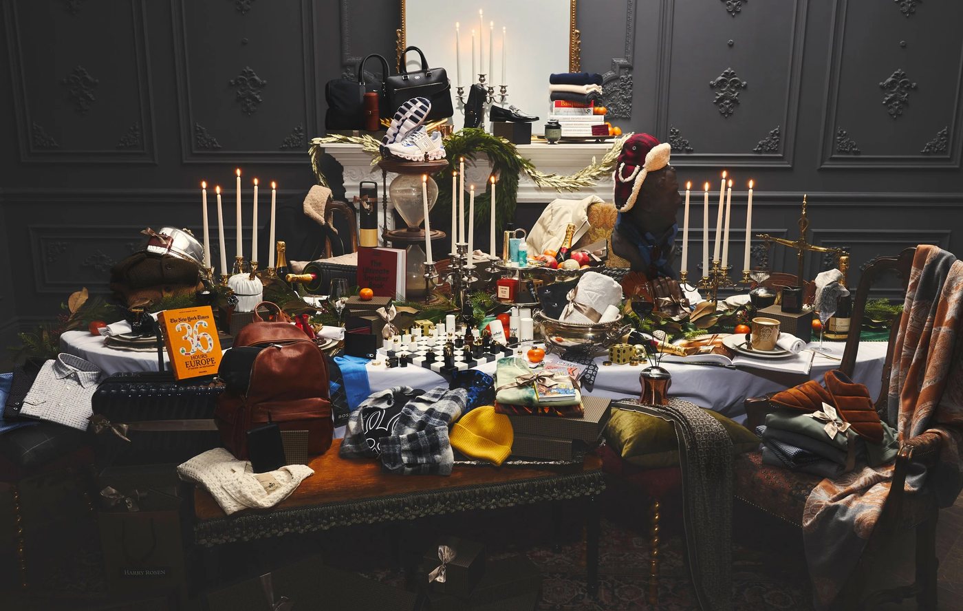 Holiday gifting campaign set, a table dressed with menswear and accessories across every product category