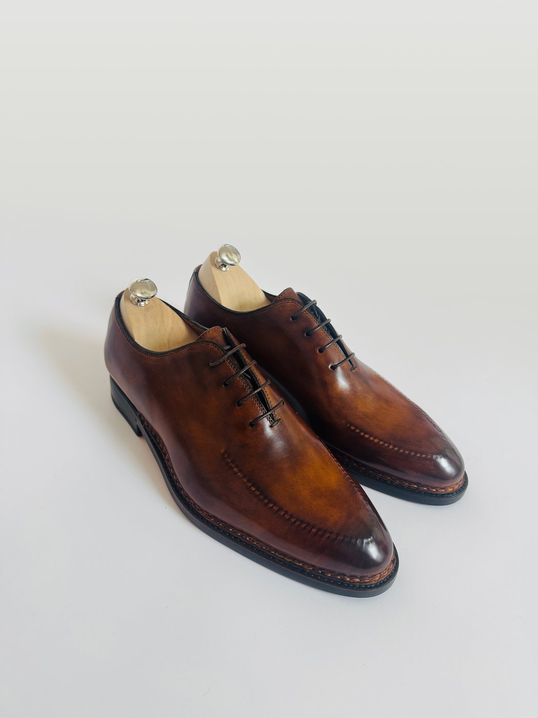 Santoni leather shoes photographed off-figure for eCommerce